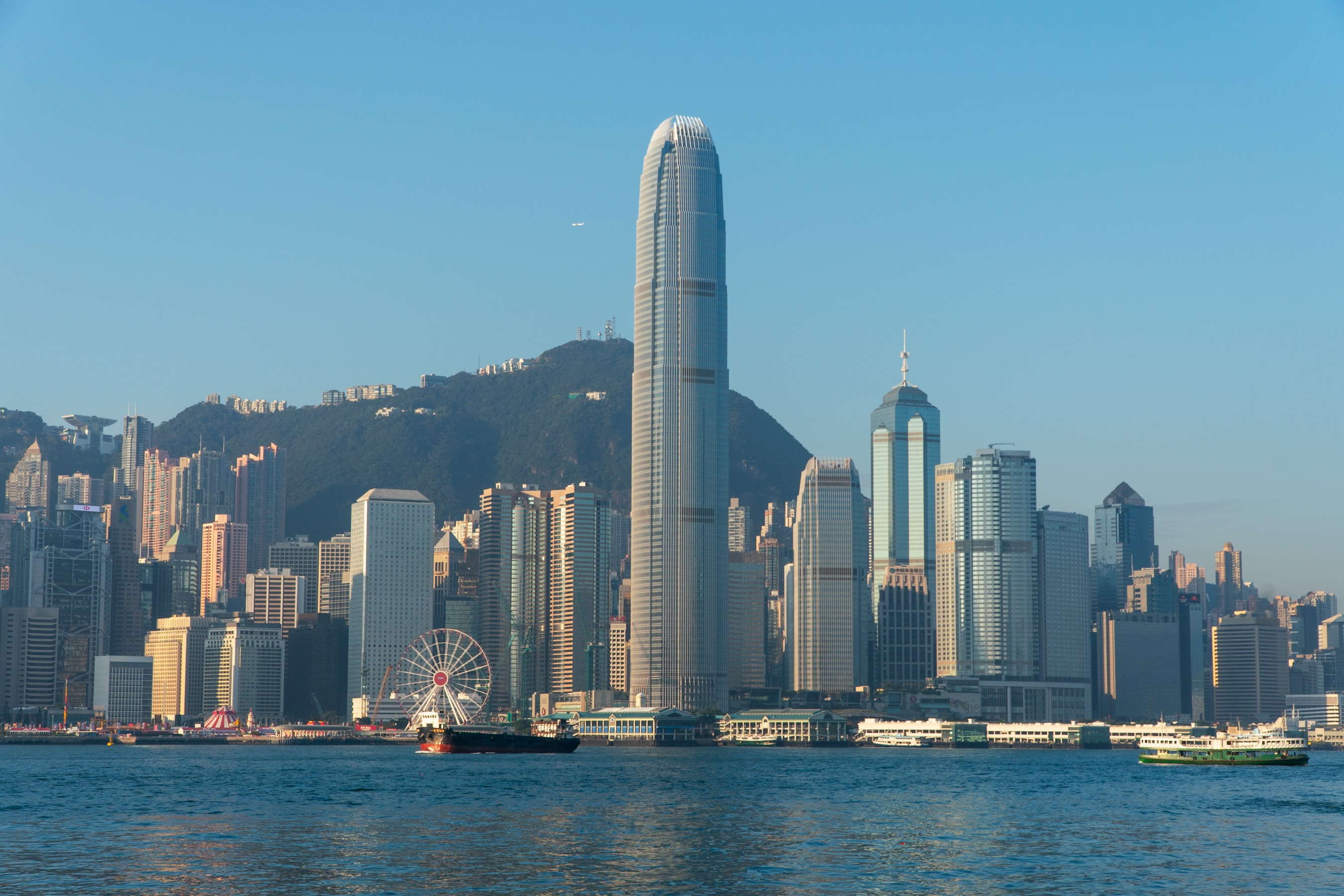 Hong Kong skyline rising over Victoria Harbour